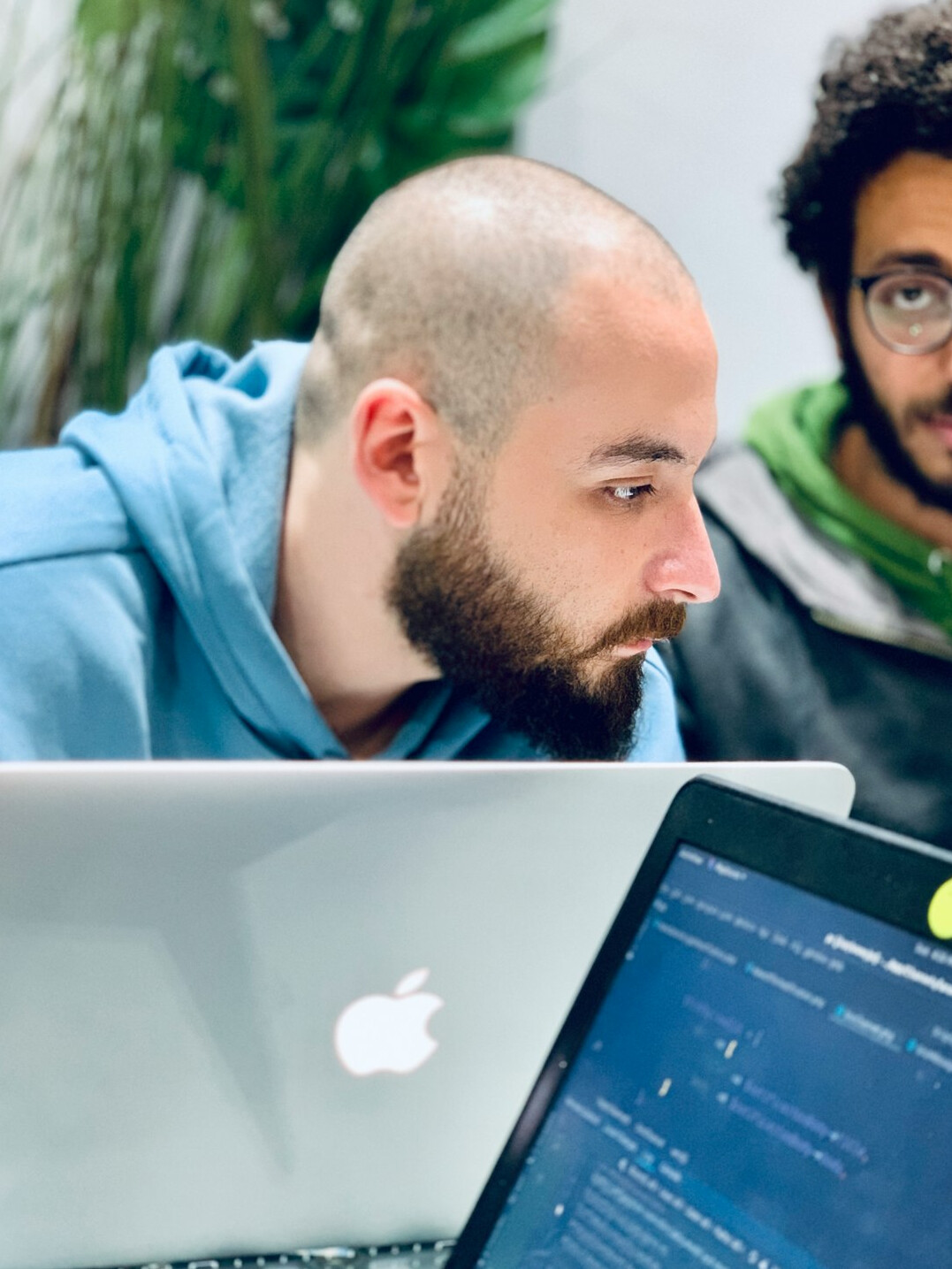 team of developers coding insurance software
