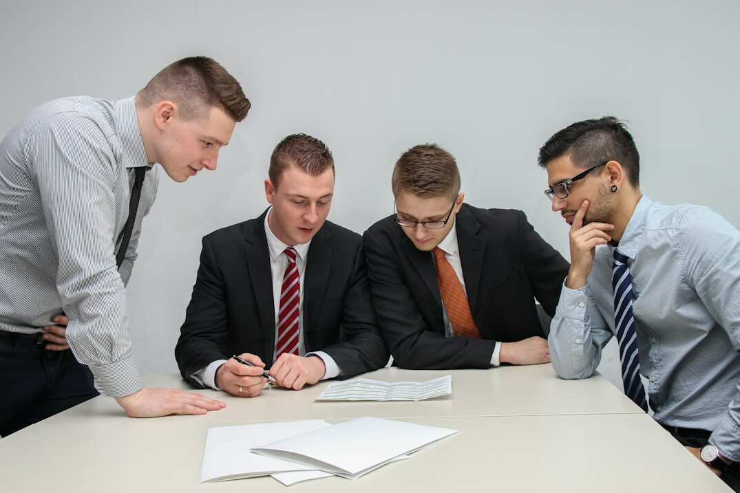 team discussing insurance policy