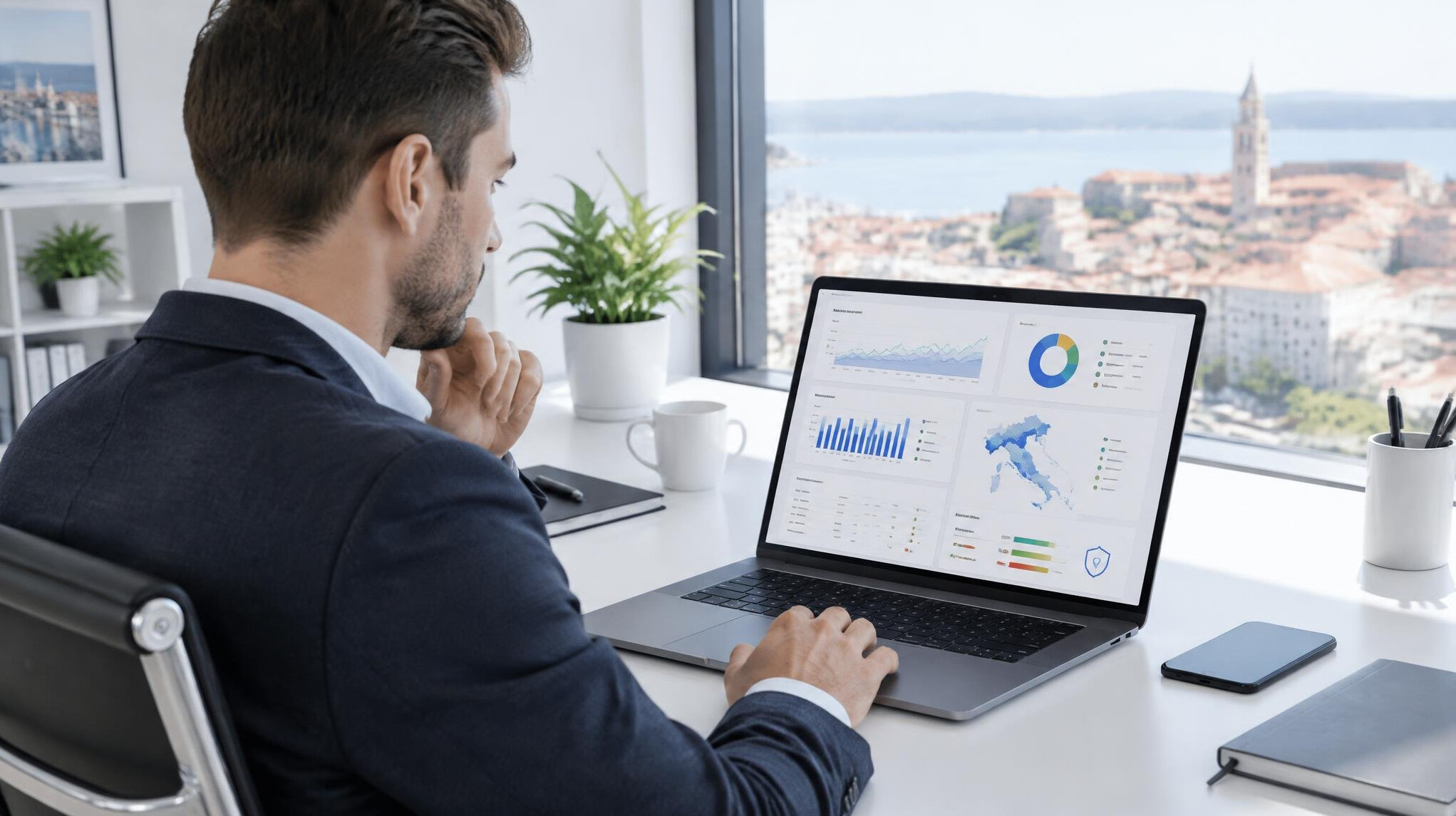 Person reviewing a digital insurance dashboard on a laptop
